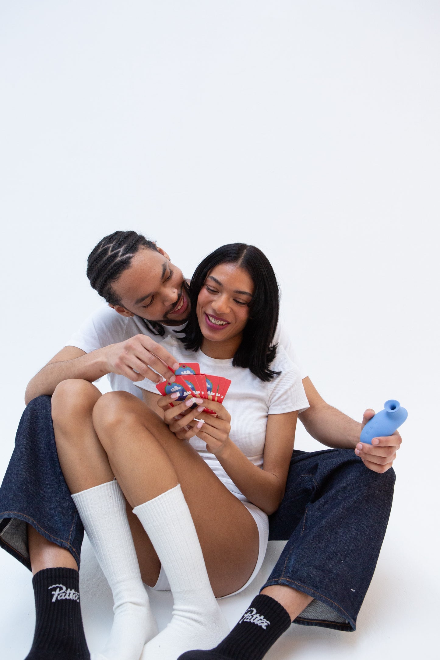 Chi The Oh Collective luchtdruk massager voor vrouwen met speelkaarten voor koppels